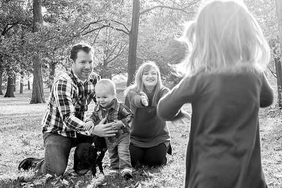 Child runs to mom and dad in Humboldt Park