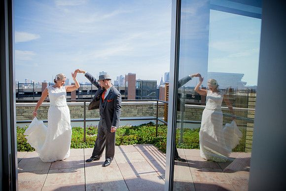 Bride is Twirled by Groom at Pabst Hotel in Milwaukee